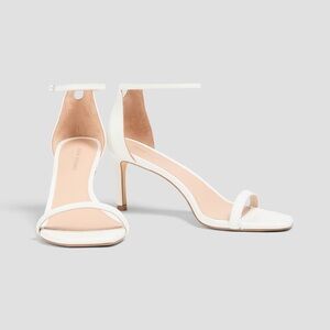 Stuart Weitzman Amelina 75 white sandals.